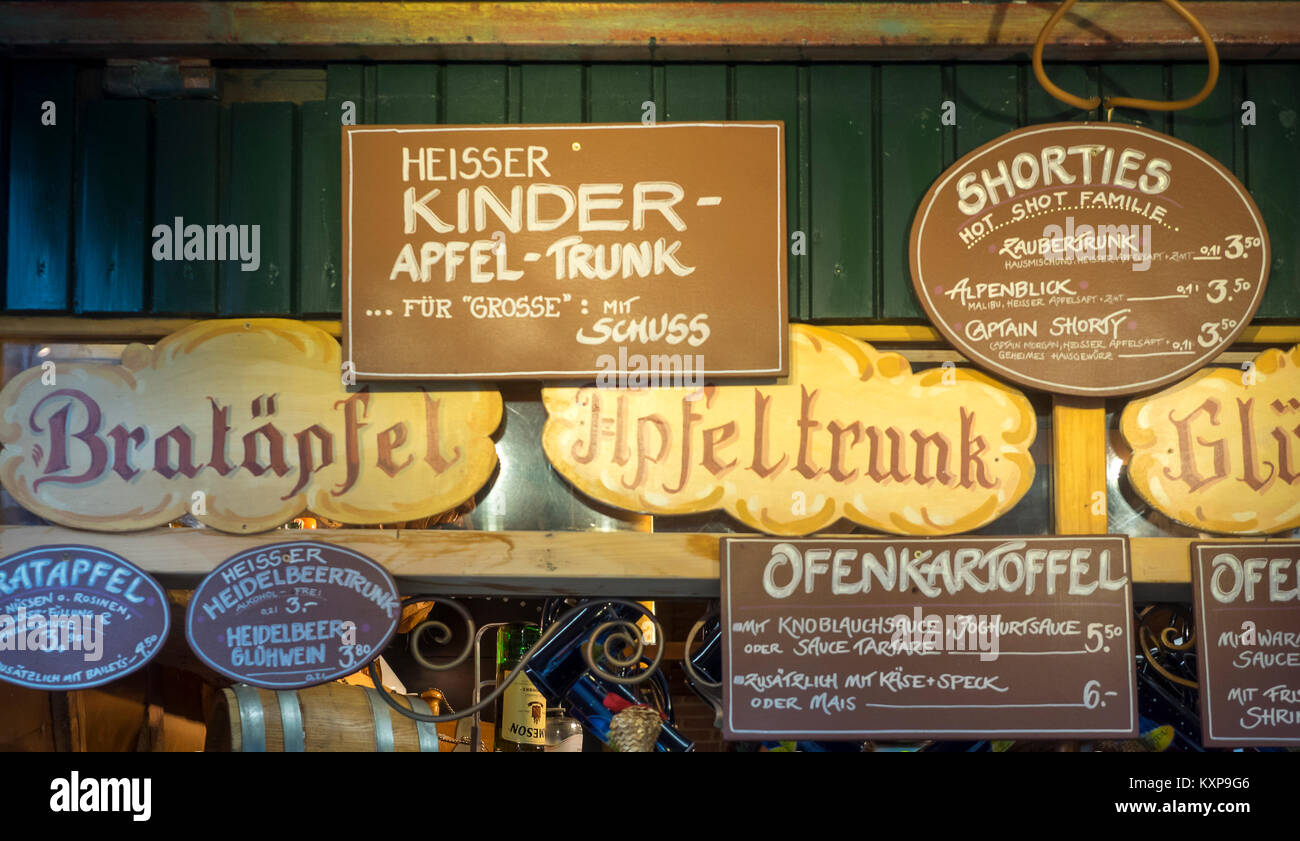 SALZBURG, AUSTRIA - DECEMBER 05, 2017:  Attractive signs on Food stall at  the Salzburg Christmas Market (Salzburger Christkindlmarkt) Stock Photo