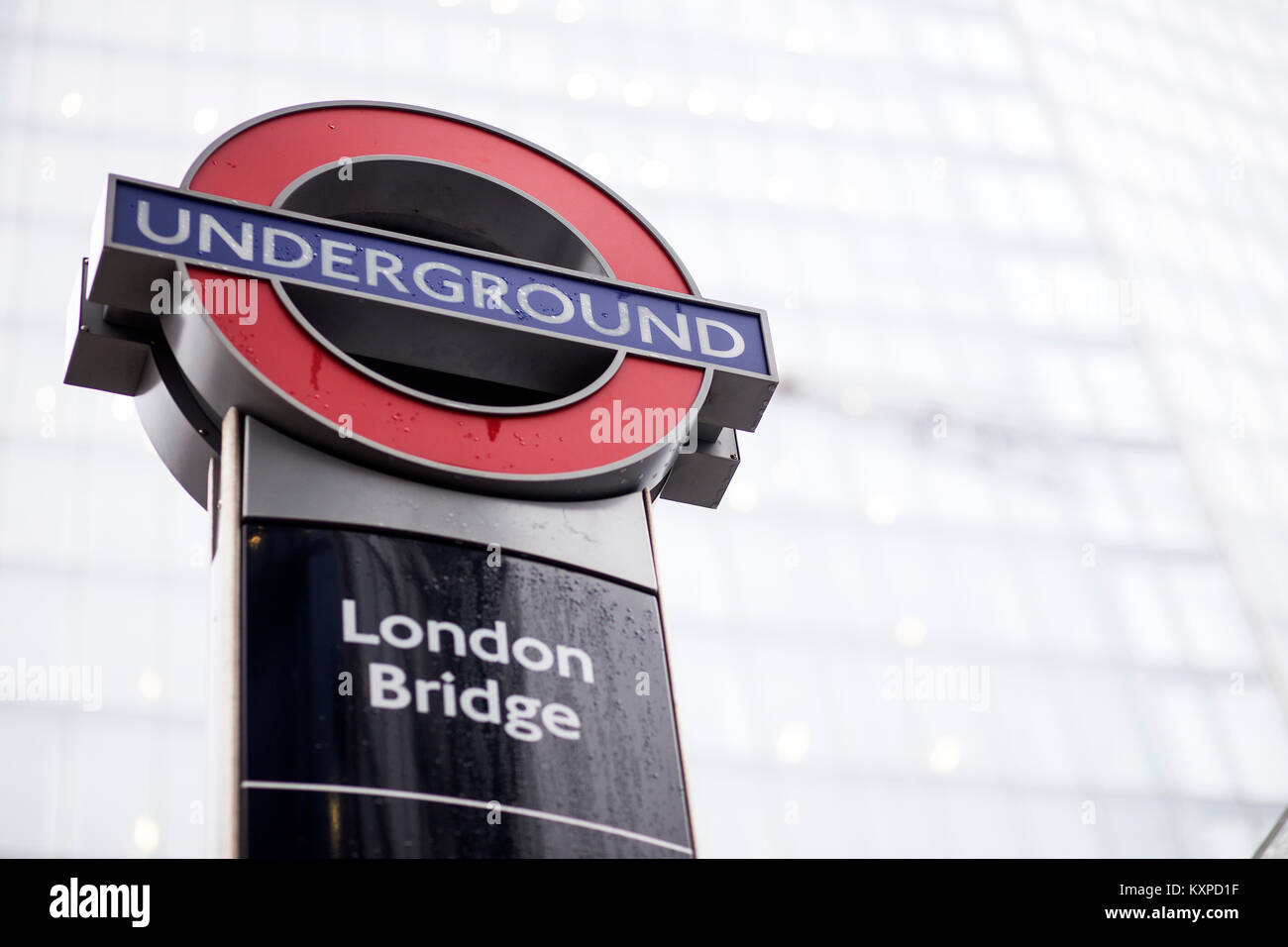 London Bridge Underground station sign outside The Shard, London Stock Photo