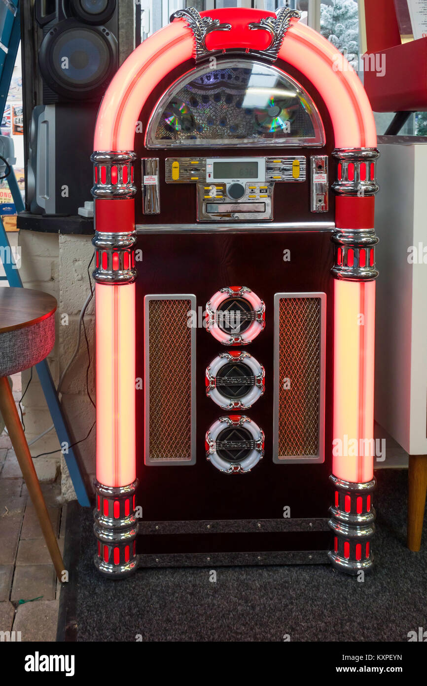 A small scale replica classial American Jukebox for playing CD's for sale for home leisure use Stock Photo