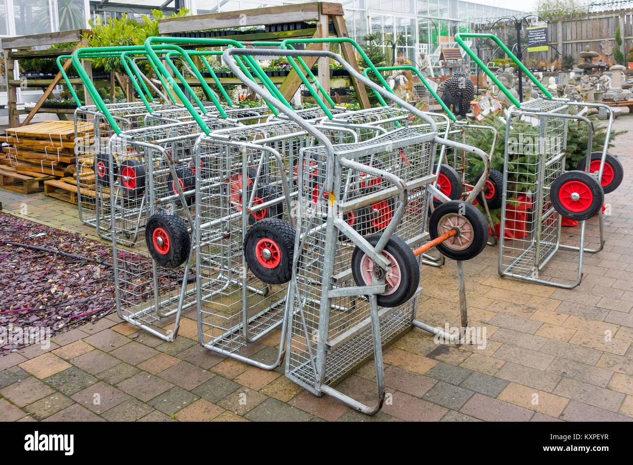 Heavy duty trolleys in a garden centre for moving large and heavy goods Stock Photo