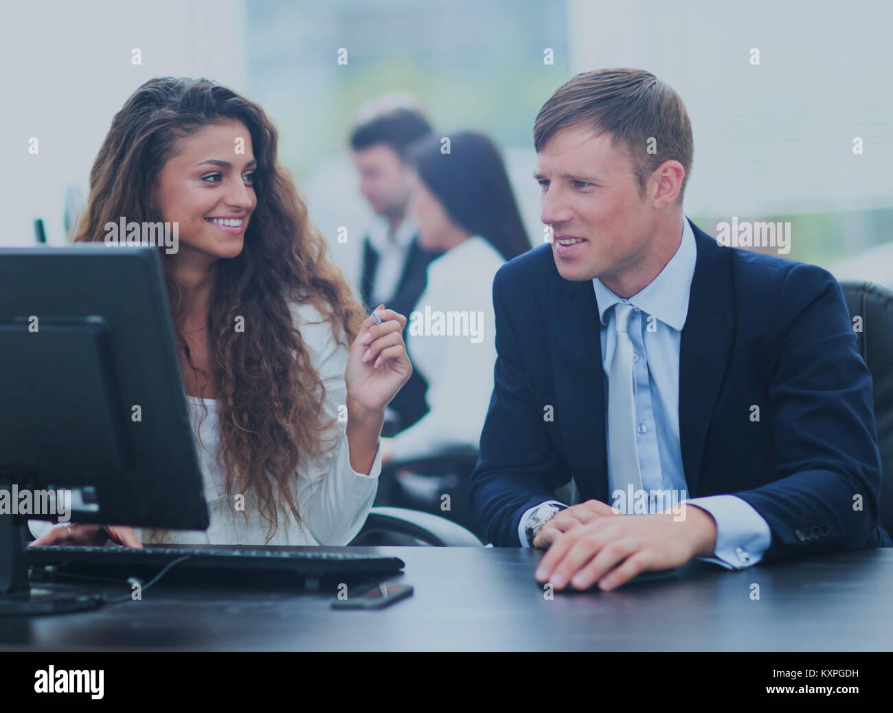 Businessman and businesswoman meeting In modern office Stock Photo - Alamy