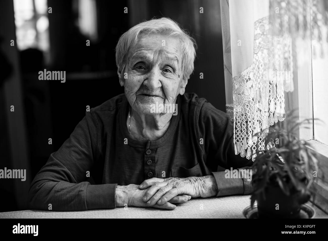 Black and white portrait of an elderly woman of 85 years Stock Photo ...