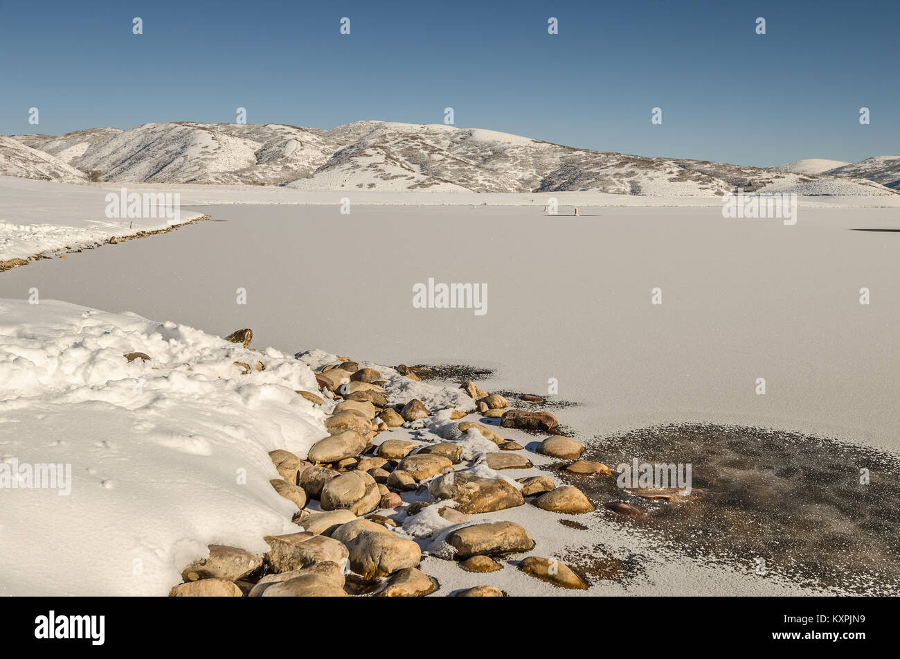 Mostly frozen Jordanelle Reservoir in Wasatch County, Utah Stock Photo