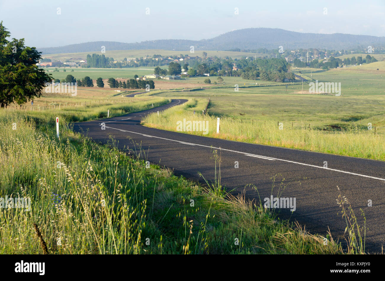 Road through countryside, Cooma, New South Wales, Australia Stock Photo