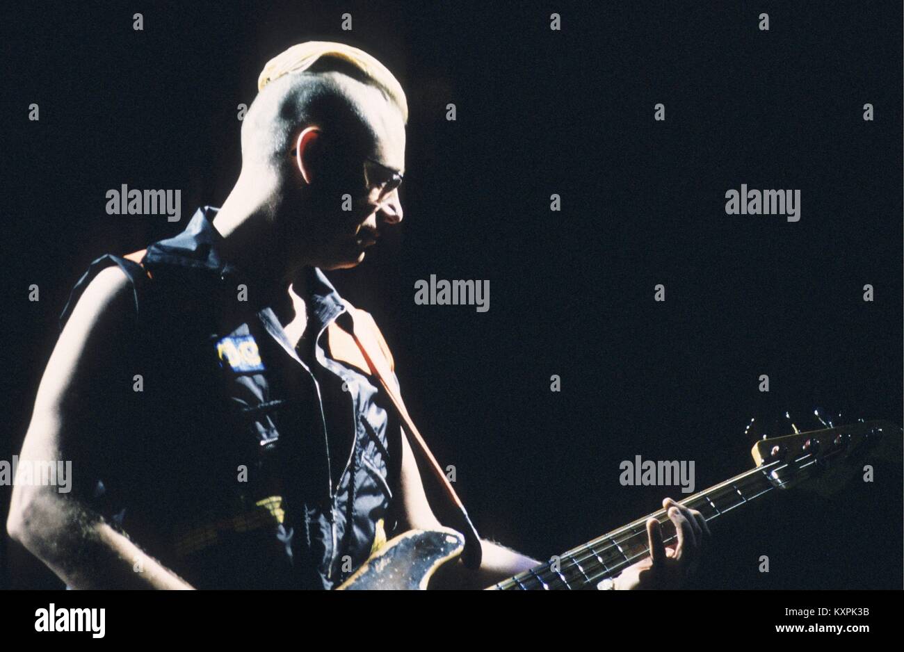 Bass player Adam Clayton of U2 performing at the sports palace in