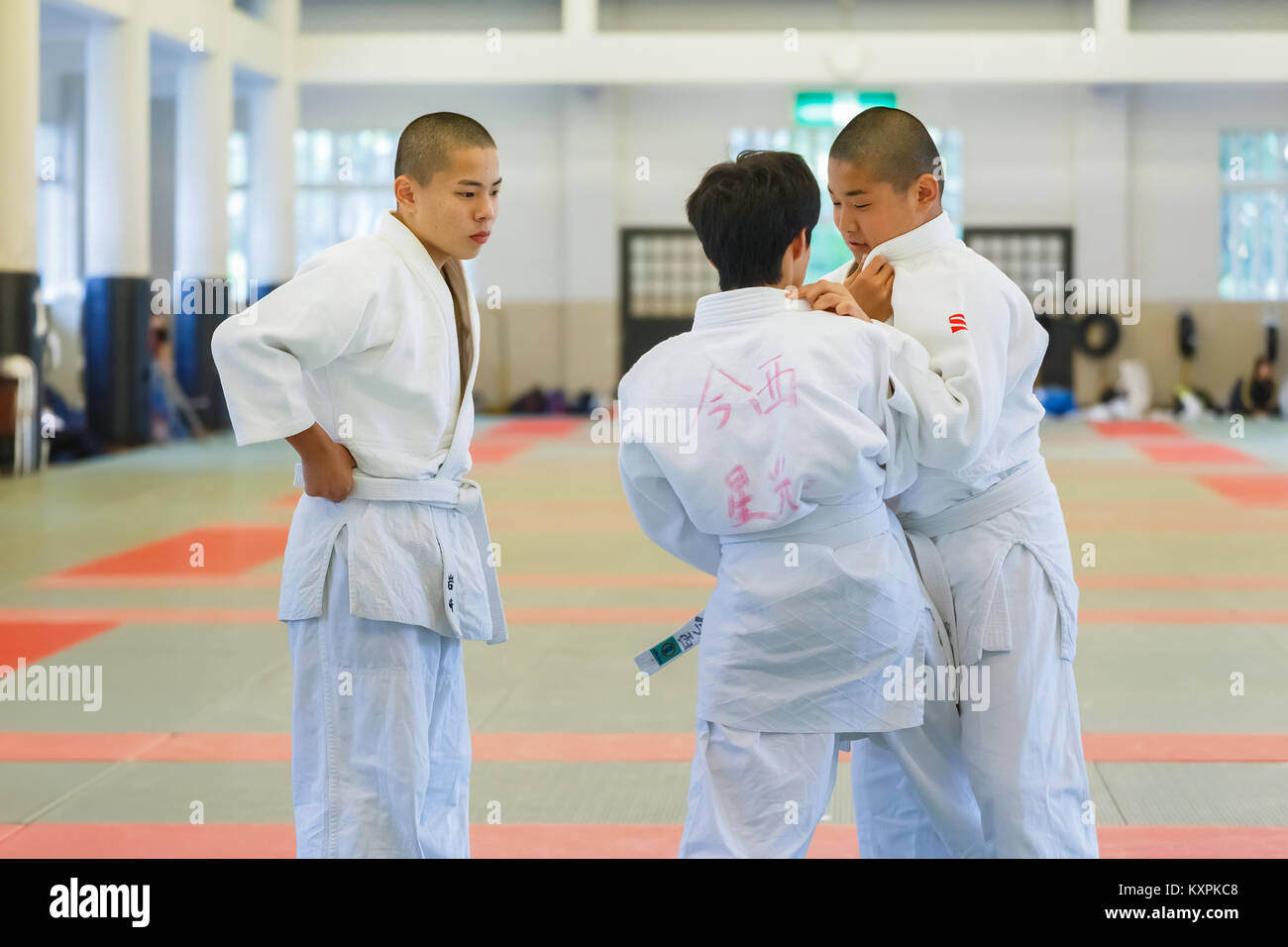 OSAKA, JAPAN - OCTOBER 25: Shudokan Hall in Osaka, Japan on October 25, 2014. Unidentified Japanese students attend the Judo class which is a traditio Stock Photo