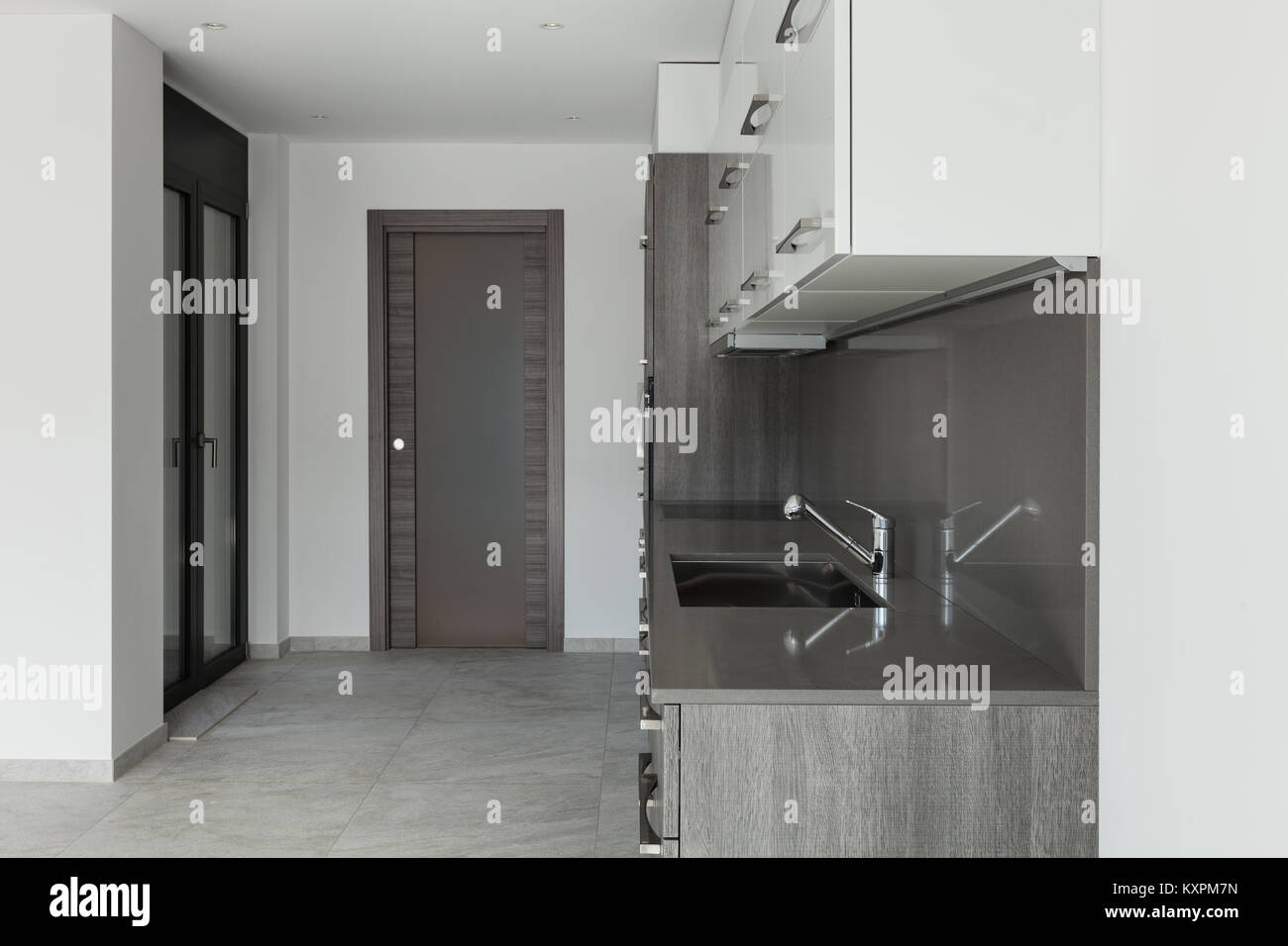 Interior of empty apartment, modern kitchen Stock Photo - Alamy