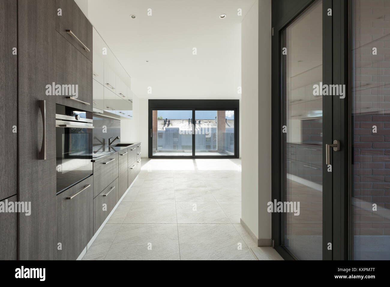 Interior of empty apartment, modern kitchen Stock Photo - Alamy