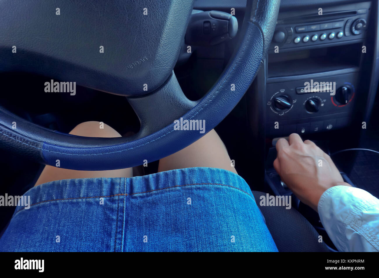 Woman behind steering wheel hi-res stock photography and images - Alamy