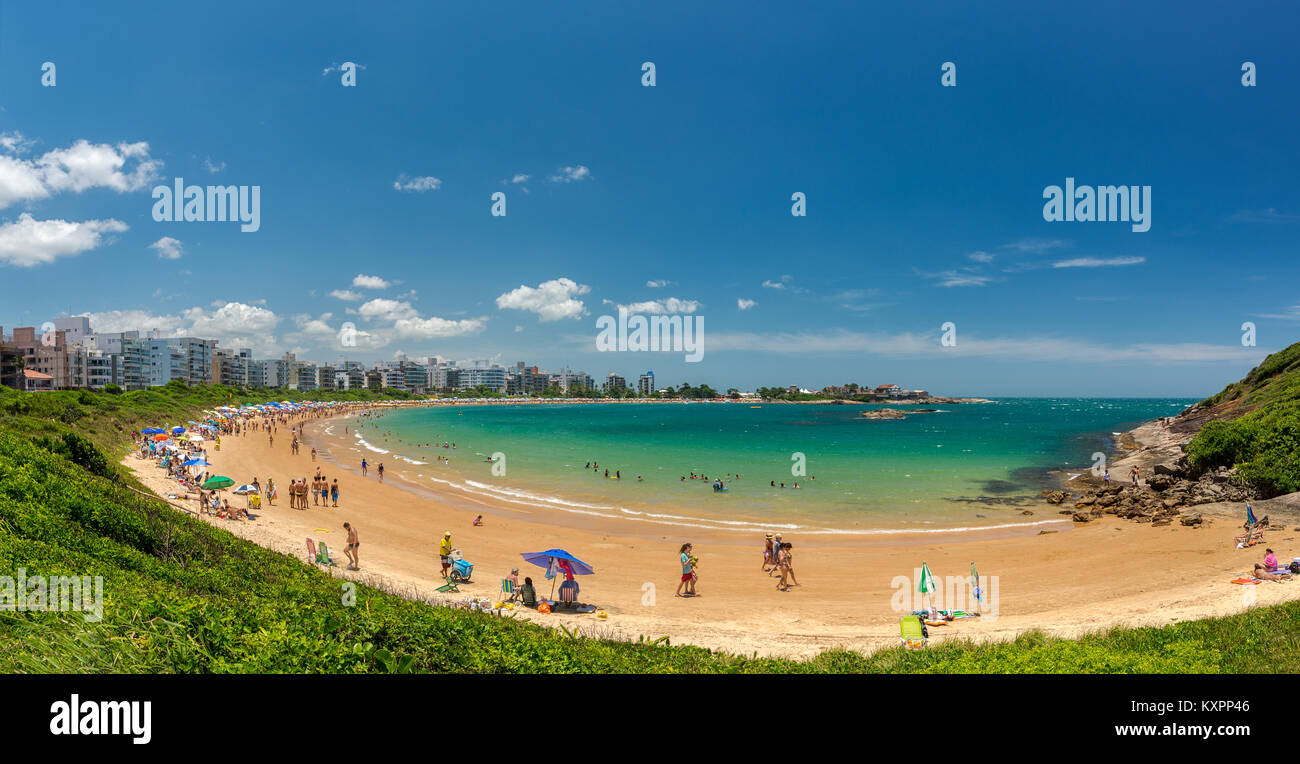 GUARAPARI, ES, BRAZIL - JANUARY 06, 2018: Panoramic view of Peracanga Beach crowded by tourists enjoying summer. Stock Photo