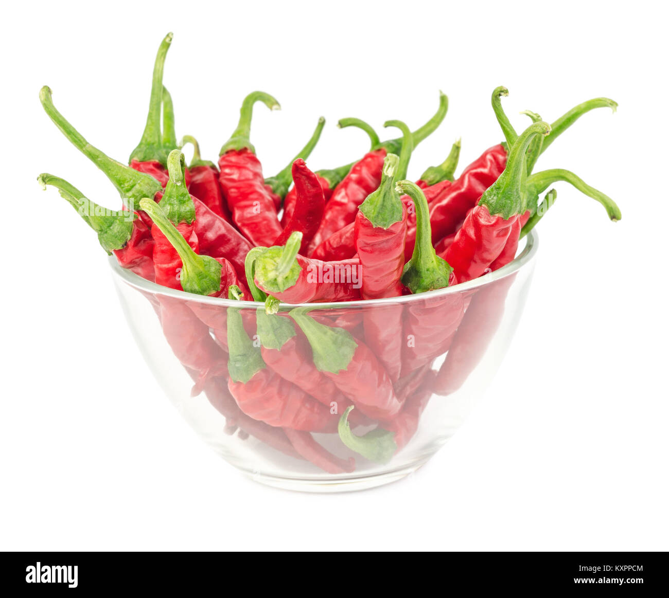 Red chili peppers in glass bowl isolated on a white background Stock