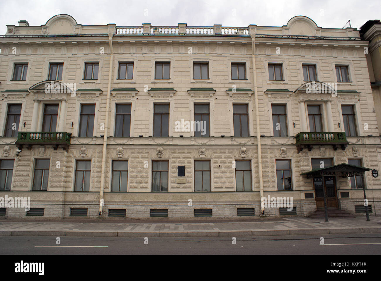 Facade with green balconies in St-Petersburg, Russia Stock Photo