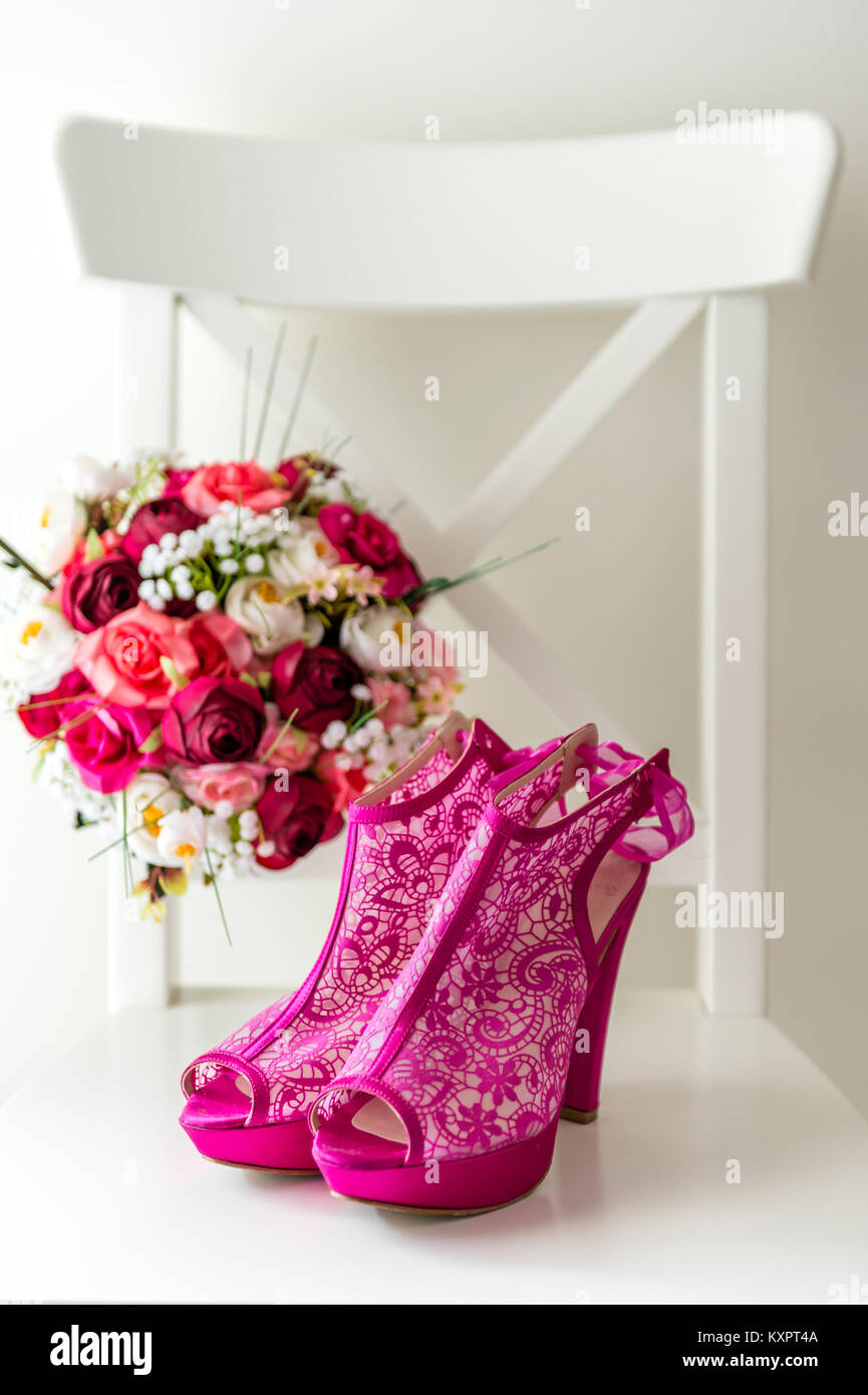 Bridal bouquet and shoes. Wedding detail photography Stock Photo