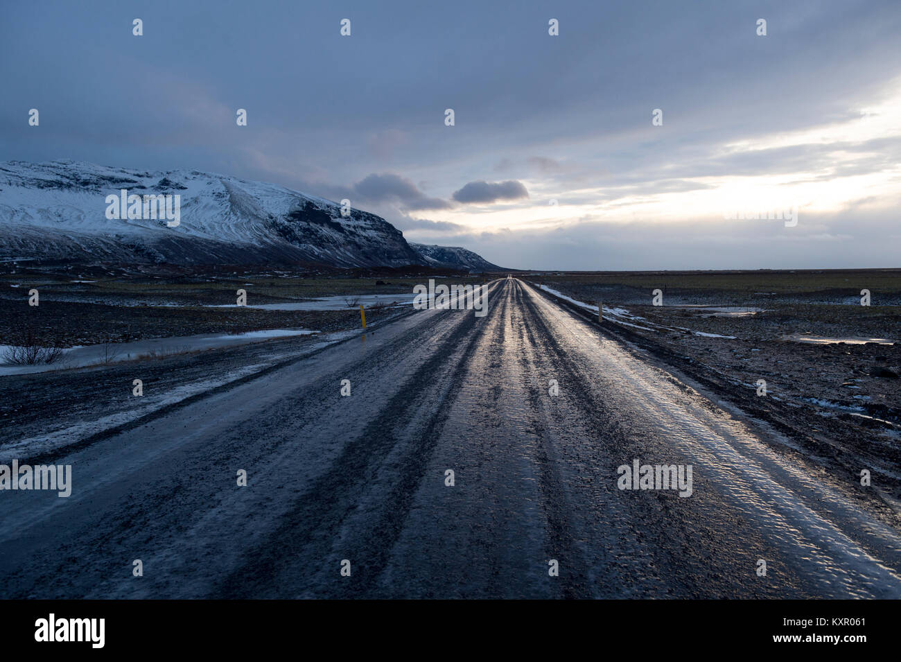 Icy road during the winter in Southeast Iceland. Stock Photo