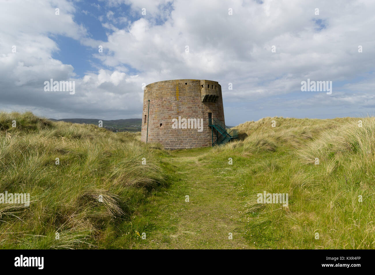 A Martello tower stands amid sand dunes near Magilligan point in Co. Londonderry, Northern Ireland. Stock Photo