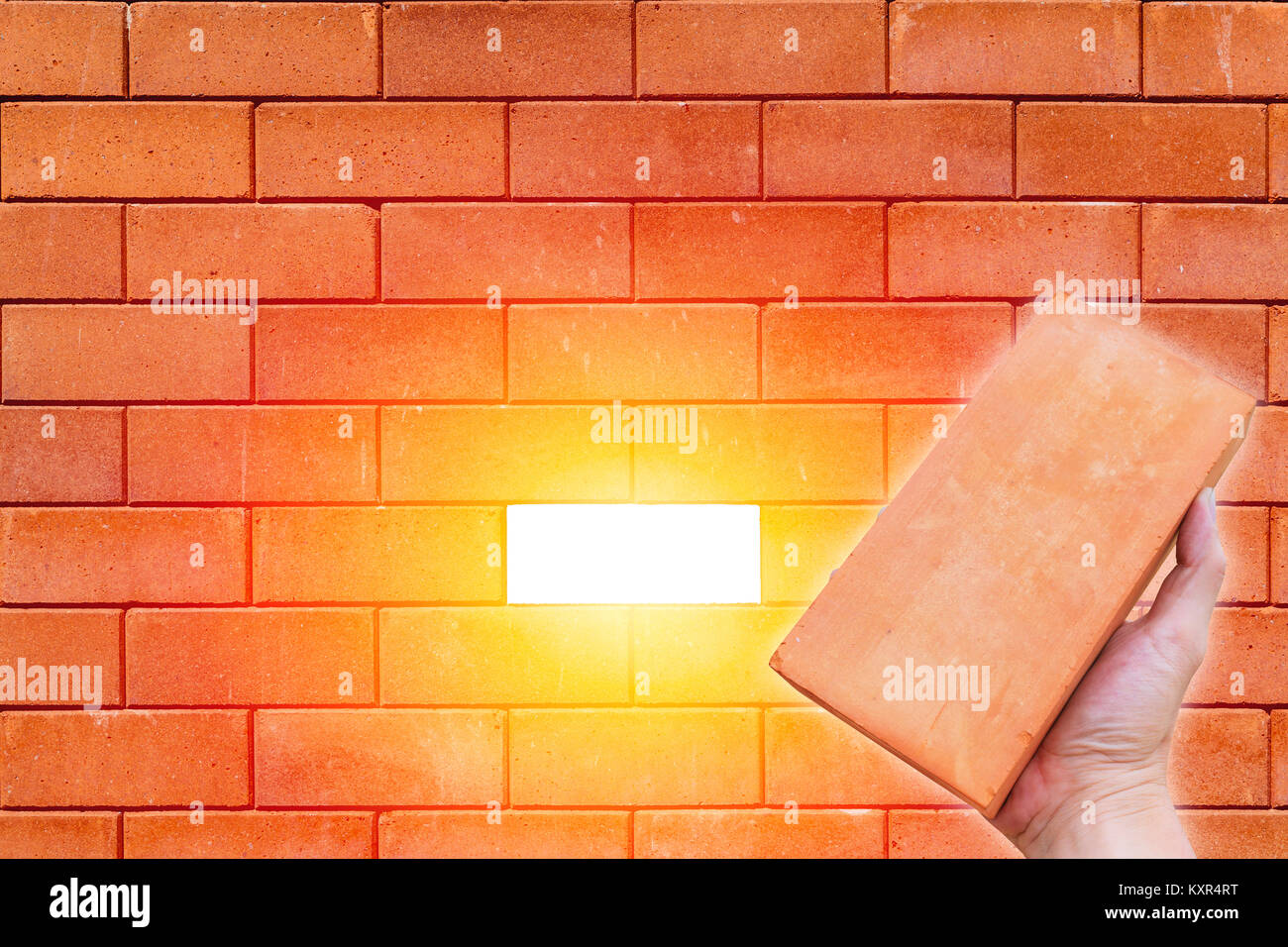 brick wall with last one block to complete job full fill business concept Stock Photo