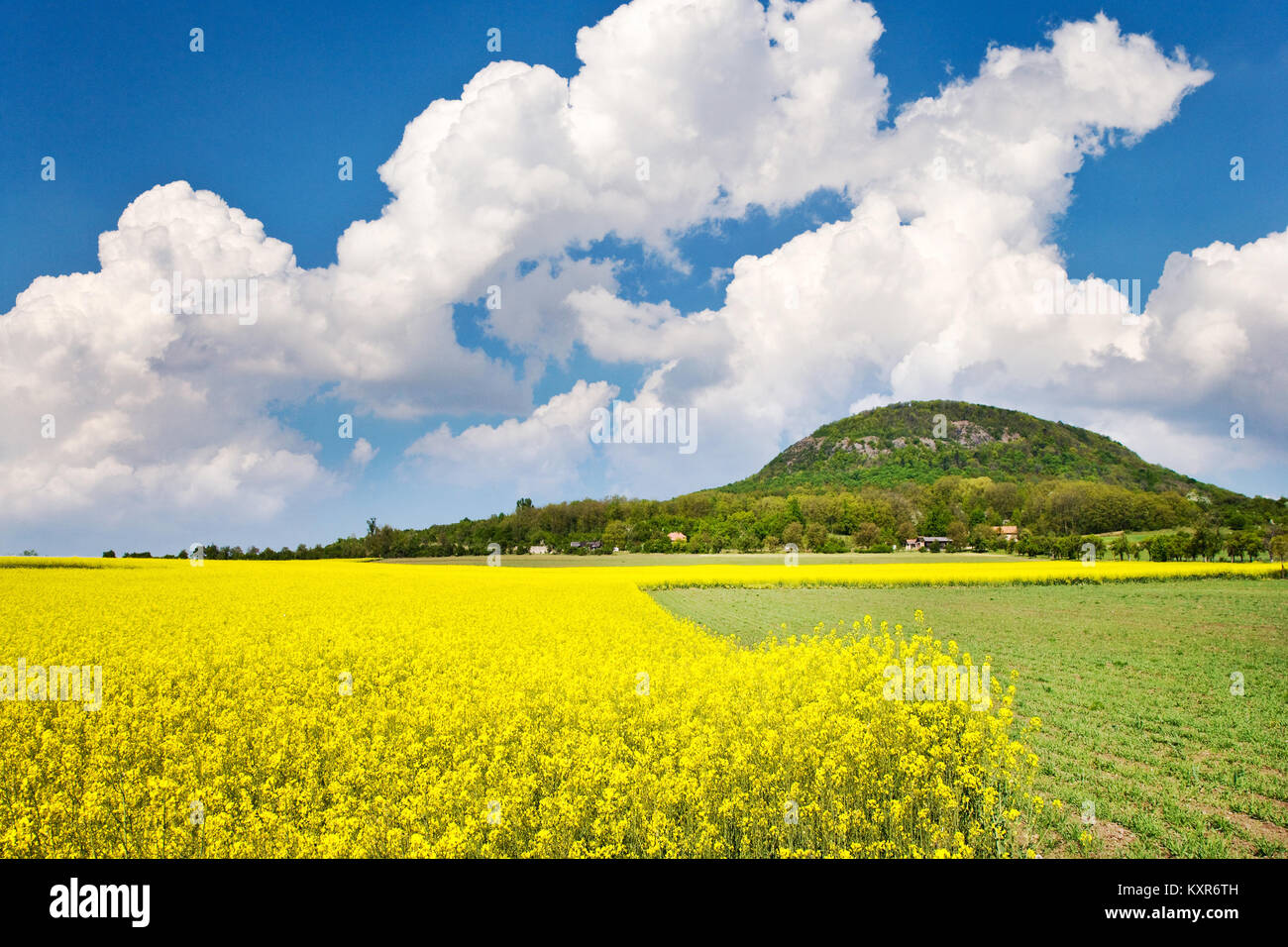 national mystic hill Rip, Central Bohemia, Czech republic - spring landscape with green fields and blue sky with clouds Stock Photo