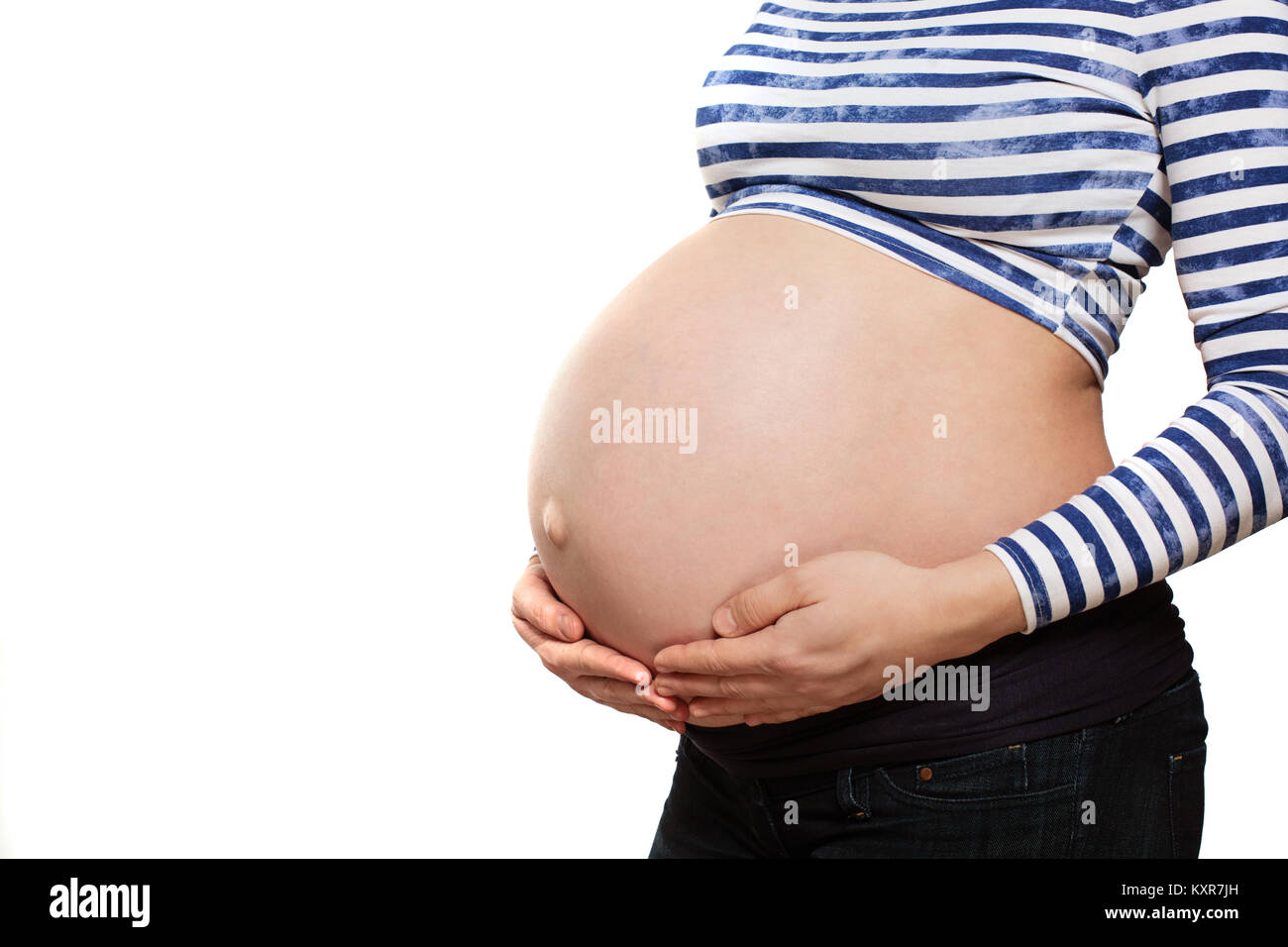 Belly of the Pregnant Mother Isolated on White Stock Photo