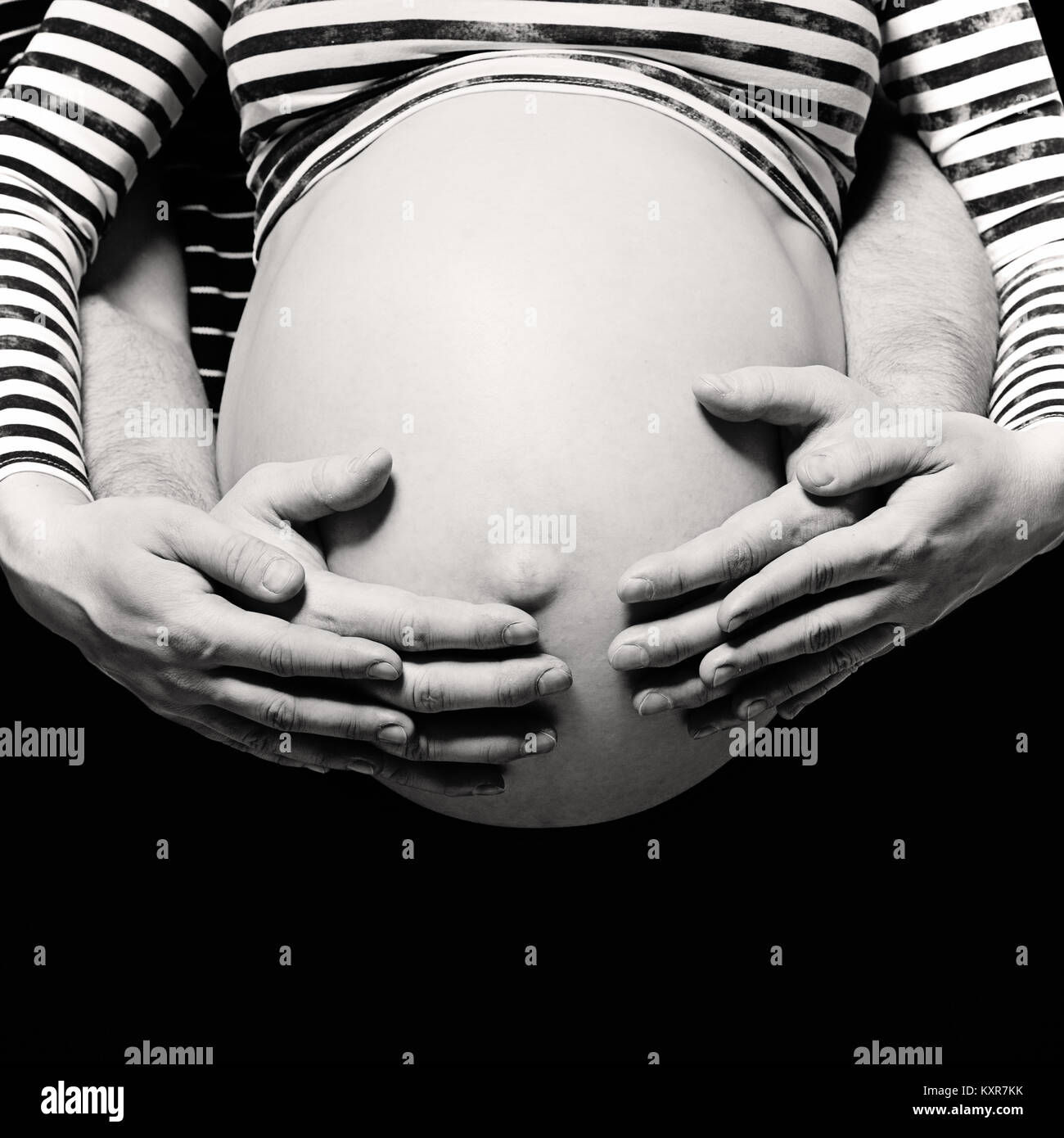 Parental Love and Care Concept. Man and Woman touching Pregnant Belly ...