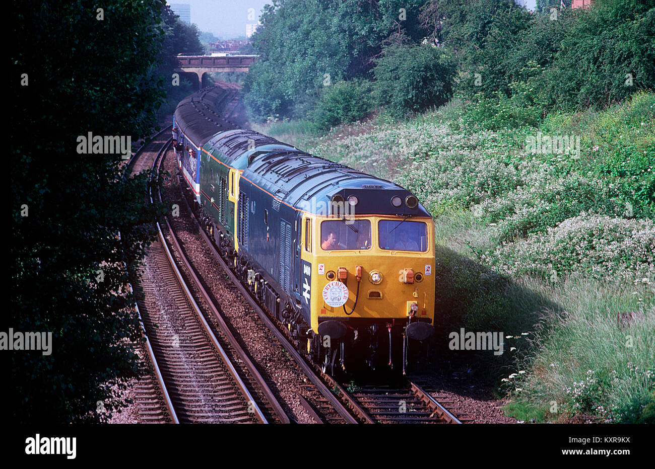 A pair of class 50 diesel locomotives numbers 50050/D400 and 50007 working the SRR/TV50G 'Court Chester' railtour approaching Acton Wells Junction. 13th June 1992. Stock Photo
