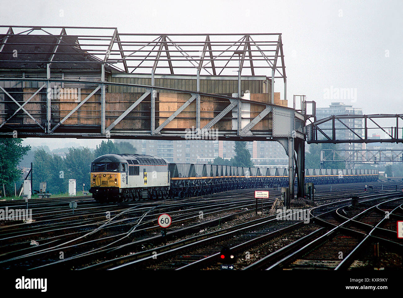 A class 56 diesel locomotive number 56013 working a merry go round coal train at Clapham Junction in west London. 10th October 1991. Stock Photo