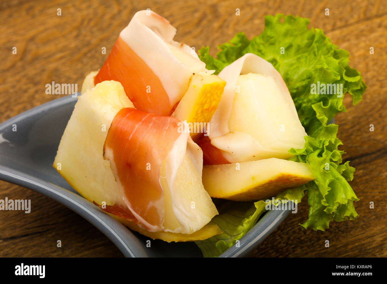 Spanish Hamon with melon Stock Photo - Alamy