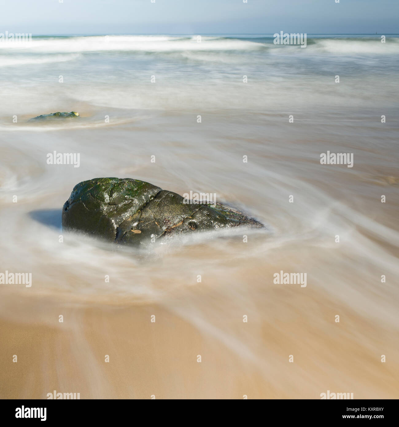 Rock in Sea Stock Photo - Alamy