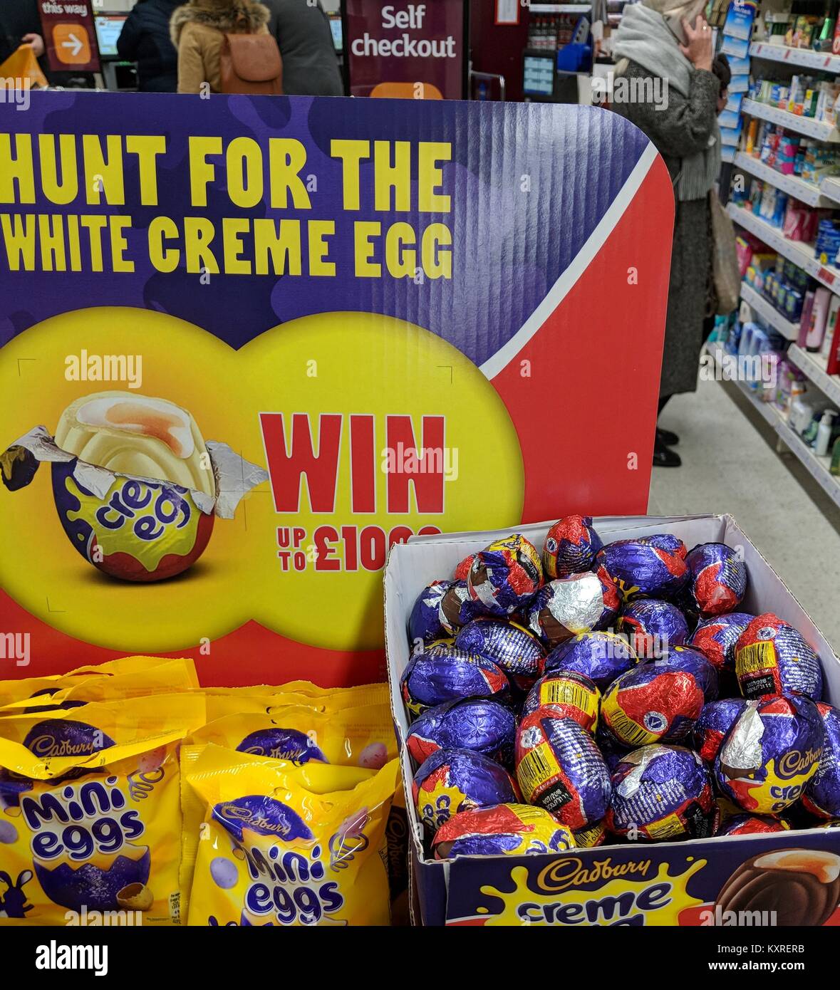 cadbury white creme egg hunt to win prize leaves some unwrapped and left in the box in stores Stock Photo