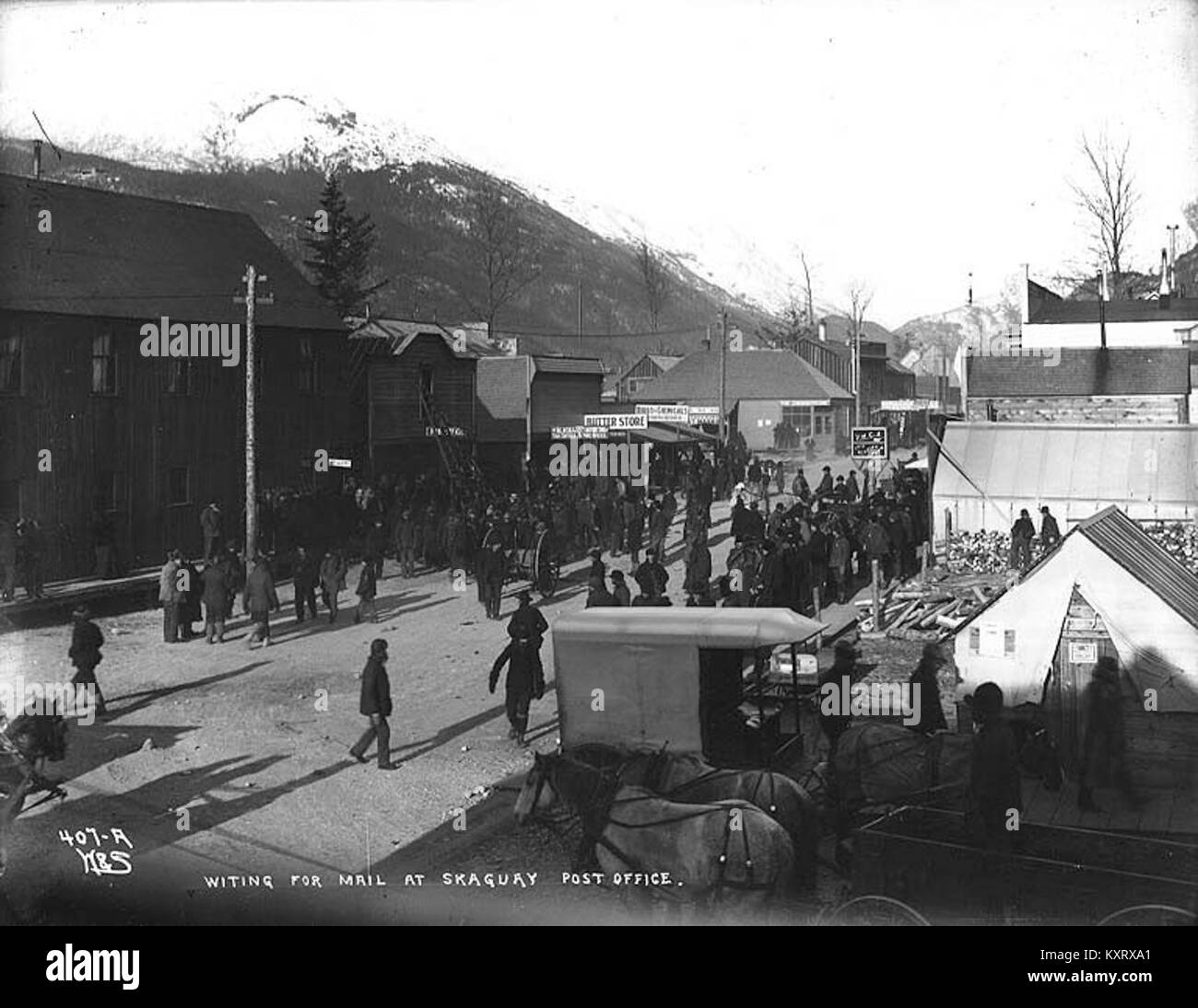 Crowd gathered outside the Skagway Post Office to receive mail, Alaska