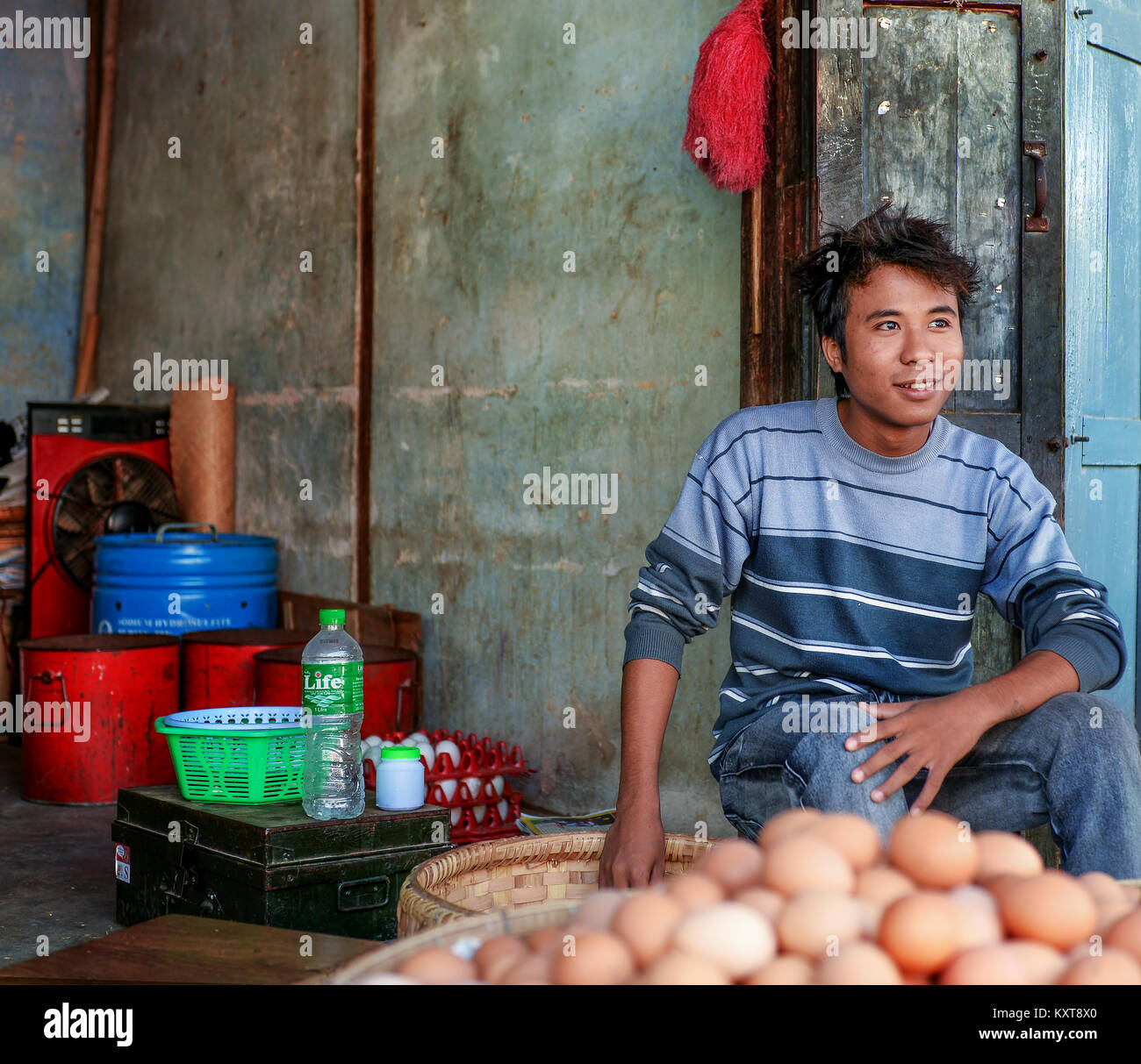 Men selling eggs in a local market in Bagan, Myanmar Stock Photo