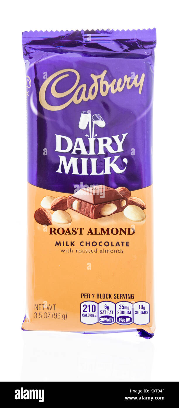 Winneconne, WI - 31 December 2017: A package of a Cadbury dairy milk candy bar with roast almond on an isolated background. Stock Photo