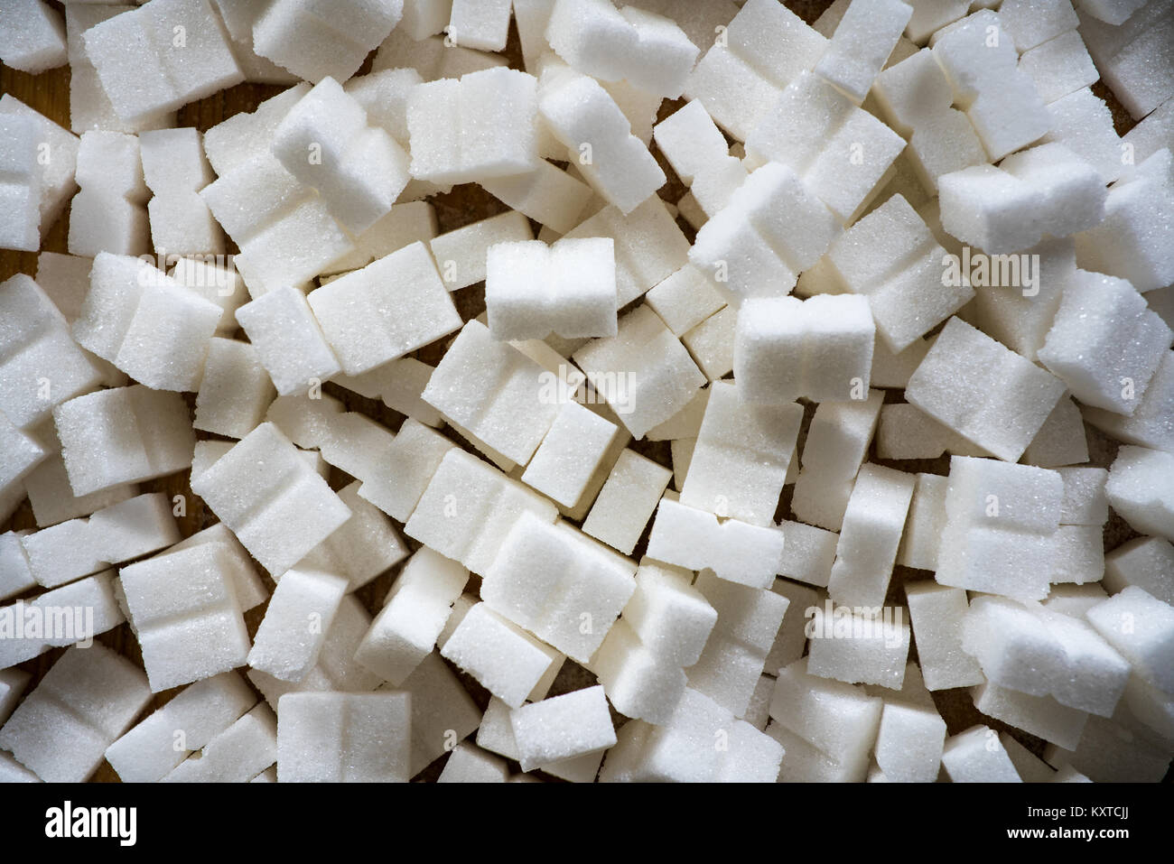 abstract horizontal background of white organic refined sugar cubes Stock Photo