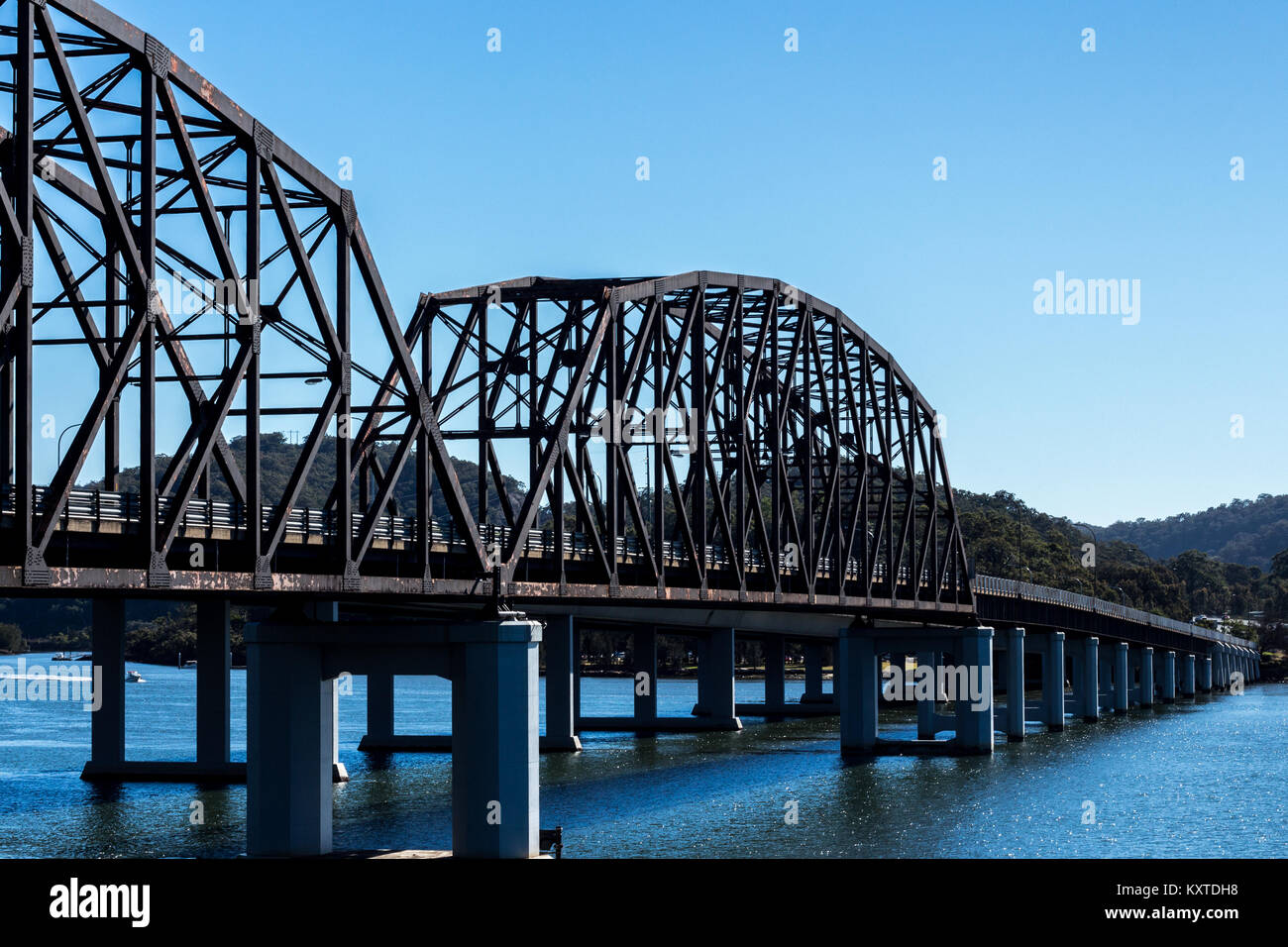 Steel road bridge spanning Hawkesbury river at Brooklyn, Australia Stock Photo