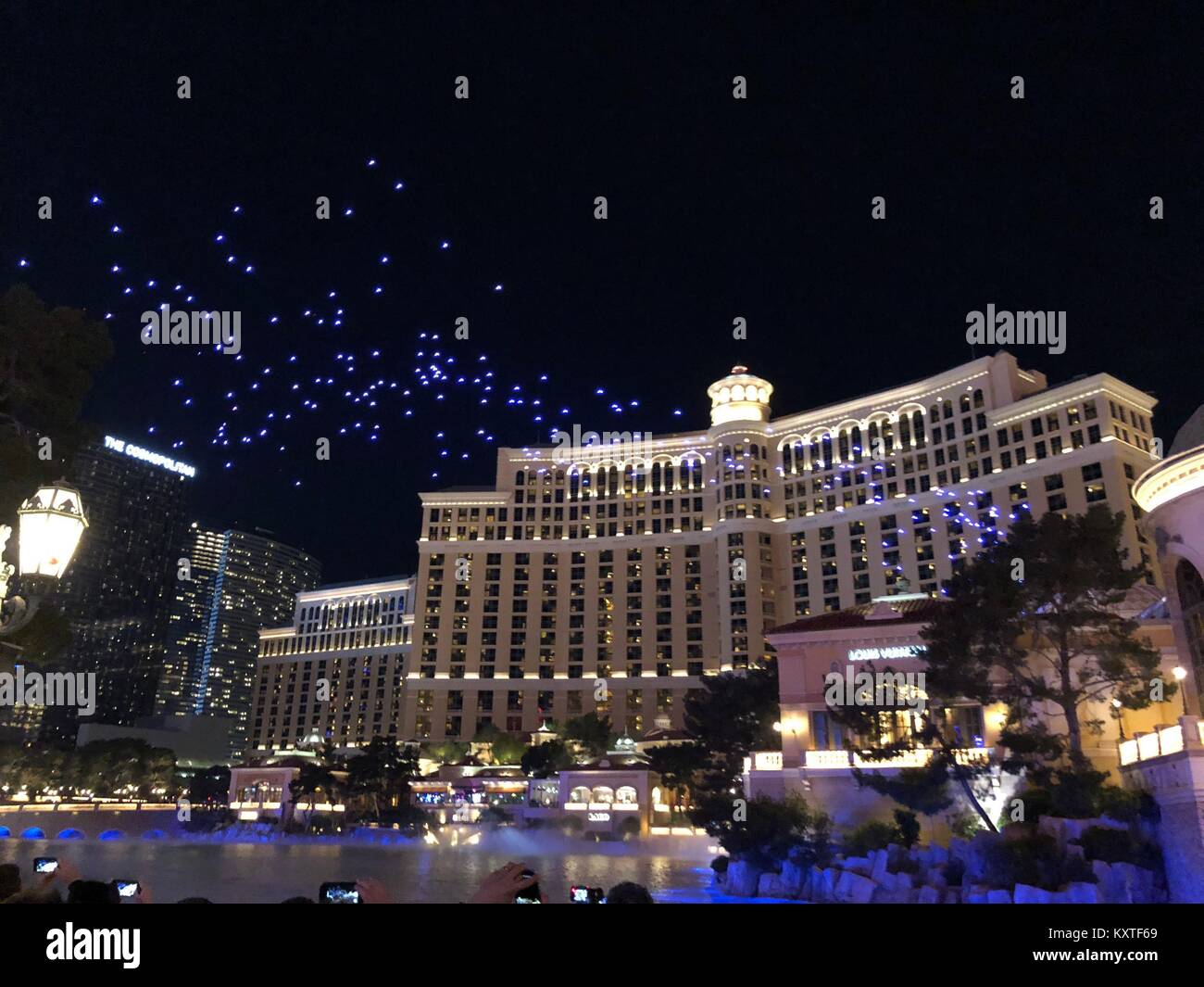 250 Intel Shooting Star mini drones taking part in a light show over the  Bellagio Hotel fountain in Las Vegas, during CES Stock Photo - Alamy