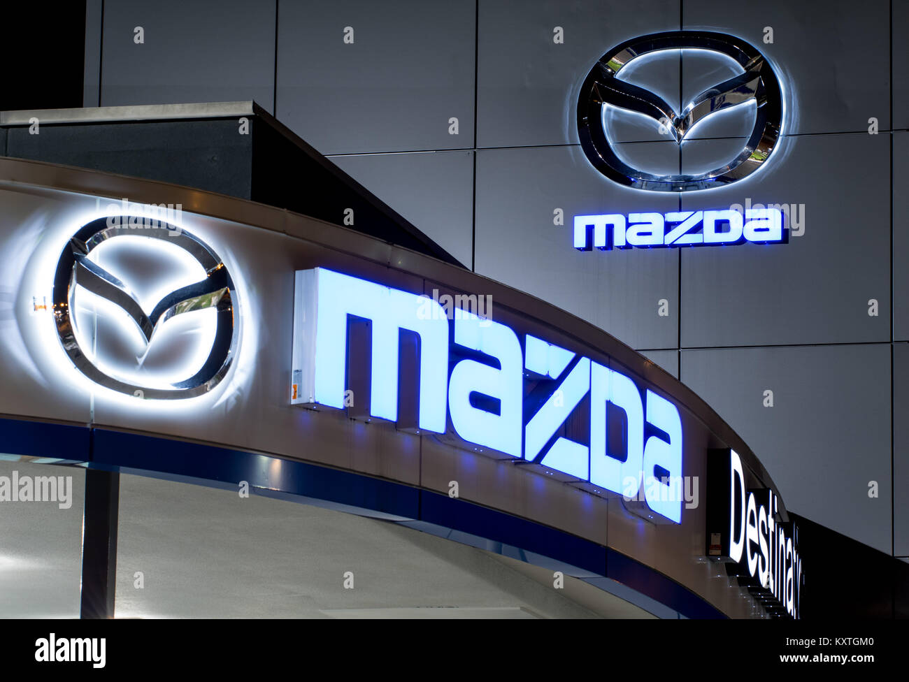 Vancouver. Canada - January 9, 2018: Mazda logo on the facade of official dealer office. Mazda Motor Corporation is a Japanese car brand, automotive m Stock Photo