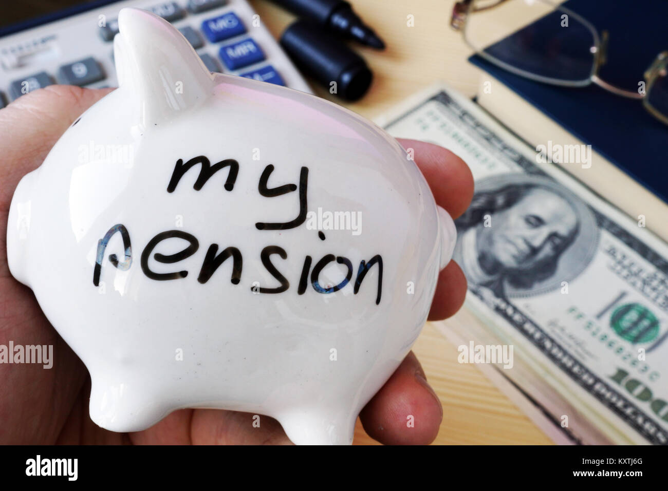 Savings for retirement. My pension on a piggy bank side. Stock Photo
