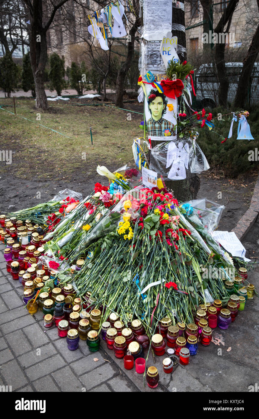 Anniversary of the Maidan massacre on the Maidan in the Ukrainian capital of Kiev, where portraits of murdered protesters and flowers are laid down. Stock Photo