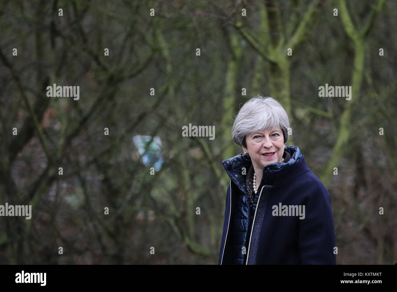 Prime Minister Theresa May walks through the grounds of the Wildfowl and Wetland Trust ahead of a speech where she set out her vision for protecting the environment. Stock Photo