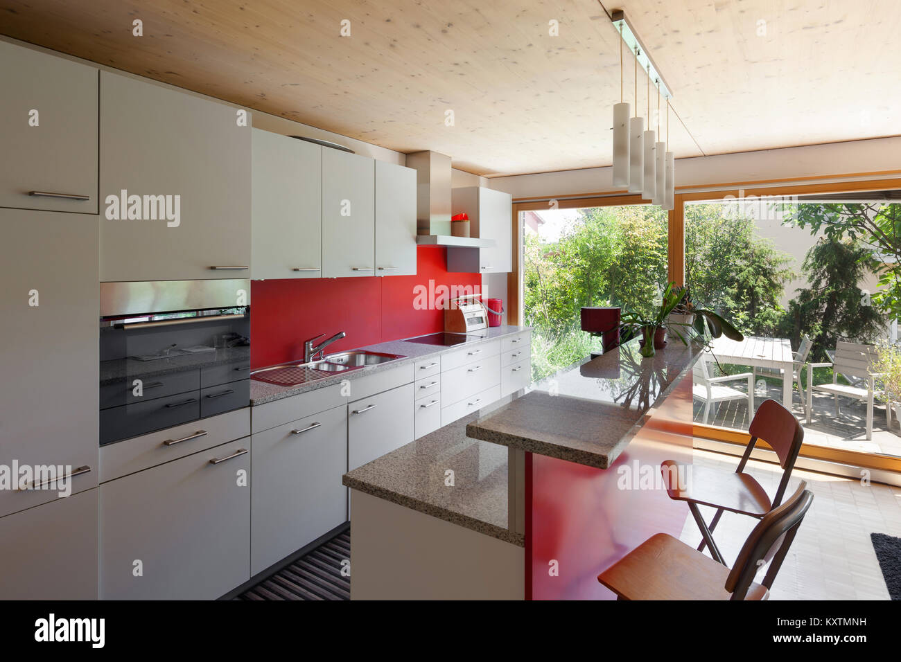 Interior of an eco house, modern kitchen Stock Photo - Alamy