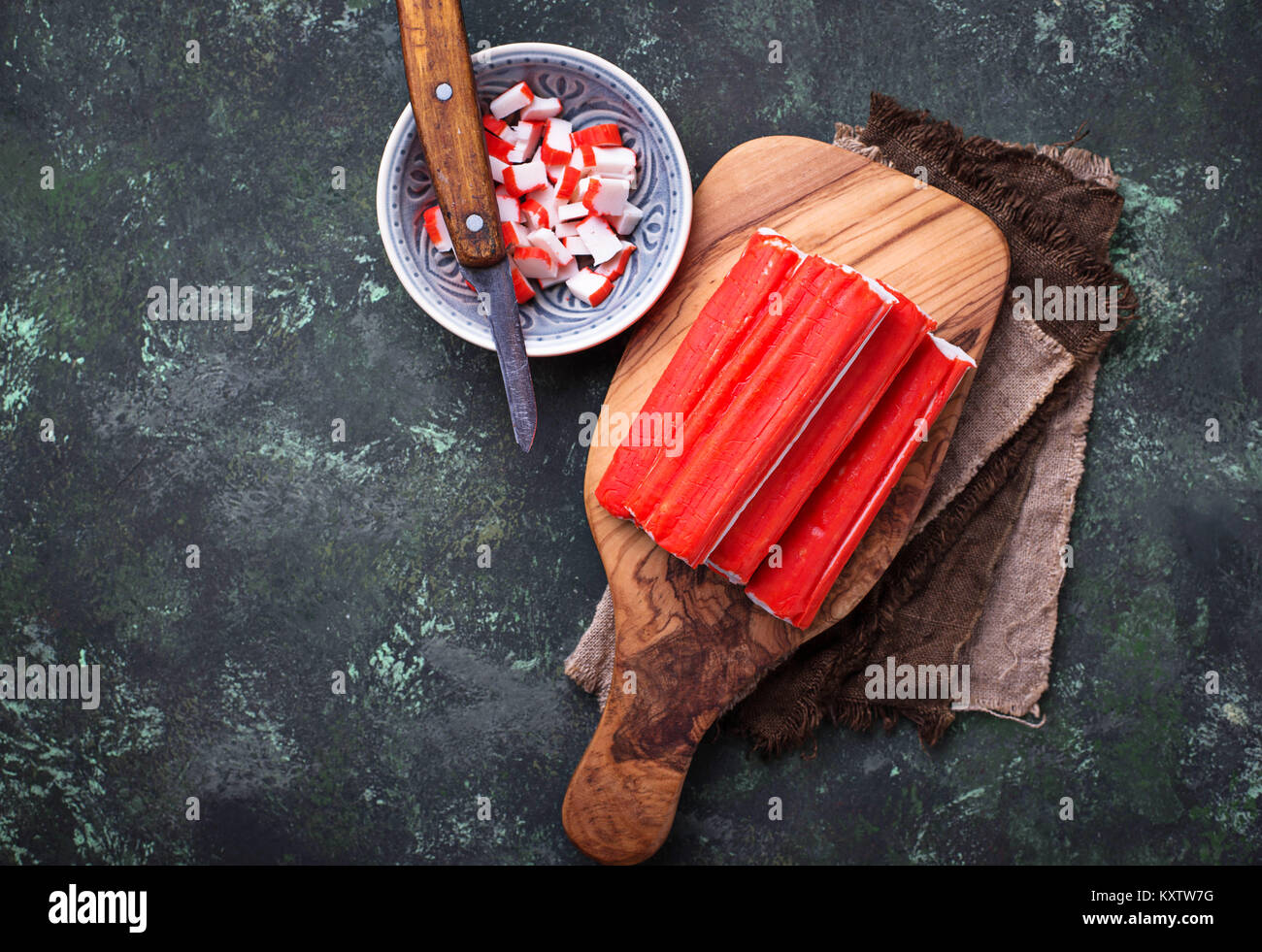 Crab sticks surimi and knife Stock Photo