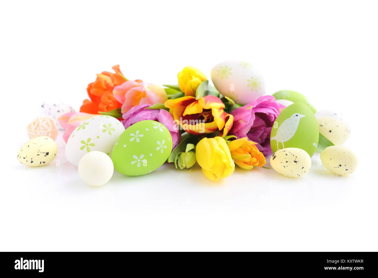 Easter eggs with tulips flowers on white background Stock Photo - Alamy