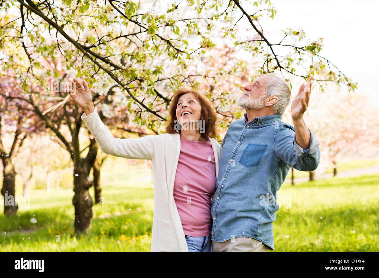 Beautiful senior couple in love outside in spring nature Stock Photo ...
