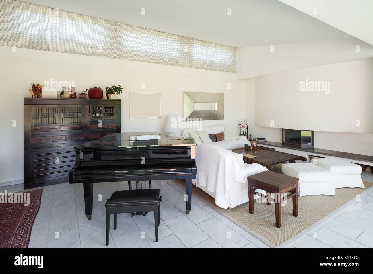 living room with piano of a modern house, interior Stock Photo - Alamy