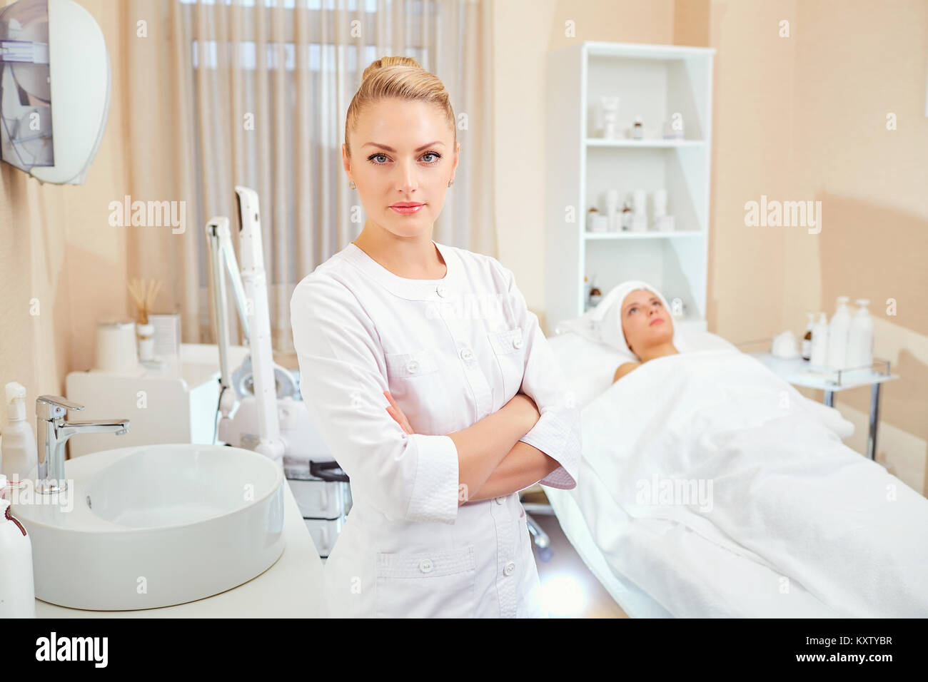 Cosmetologist is a professional with a patient in the office of Stock Photo