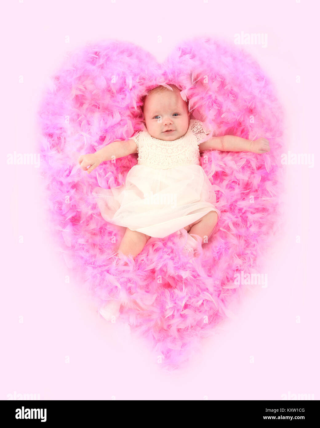 Little girl feathers hires stock photography and images Alamy