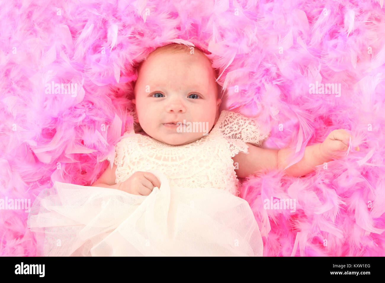 Little girl feathers hires stock photography and images Alamy
