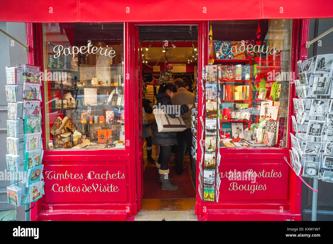 Shop Paris, exterior view of a colourful stationery shop on the Ile de la Cite in the centre of Paris, France. Stock Photo