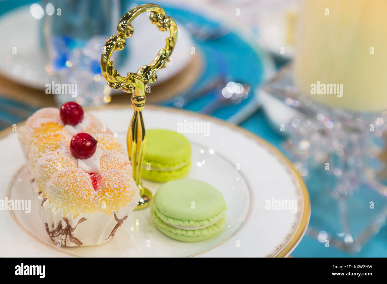 macaroon and chiffon cupcake in afternoon tea set (high tea set). Stock Photo