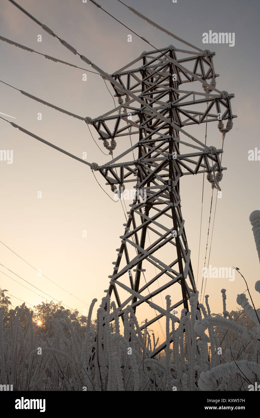 Silhouette High voltage electric tower on sunset time and sky Stock ...