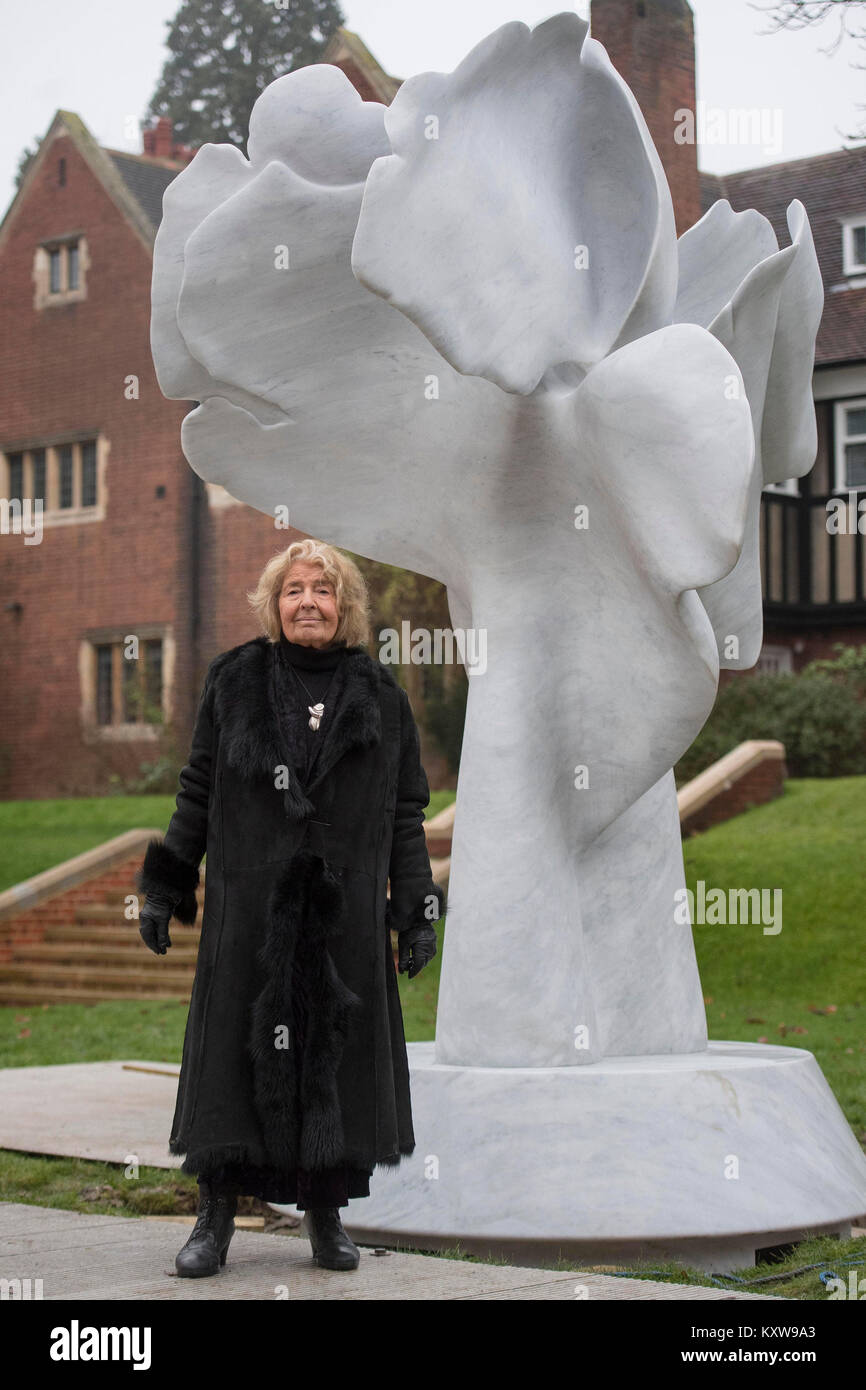 Helaine Blumenfeld with her the marble sculpture, Tree of Life